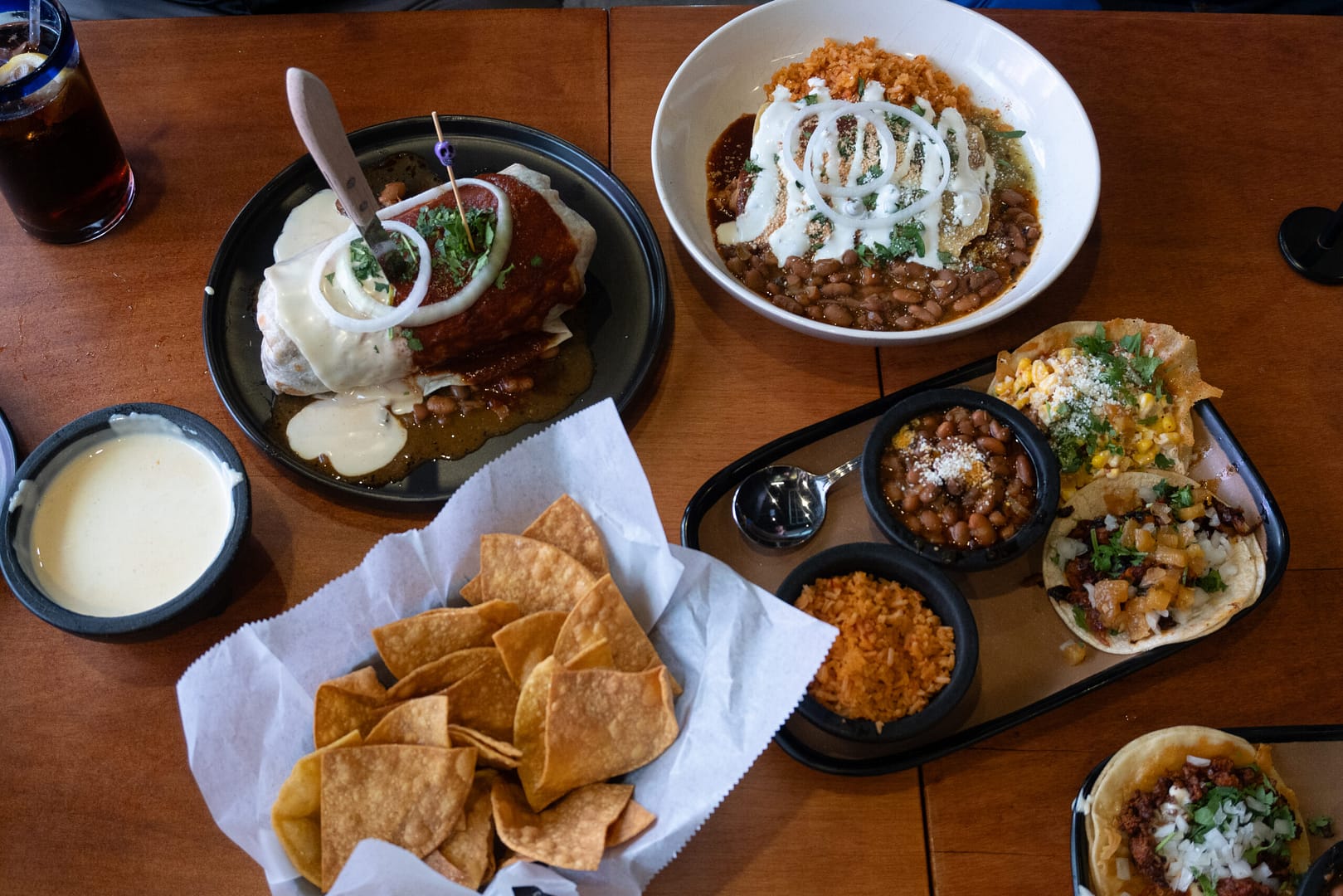 Entrees at Mercado, including a Taco Combo, Wet Burrito, Enchiladas