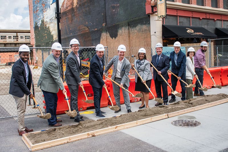 Community leaders gather for the groundbreaking for The Landing Exchange earlier this year.